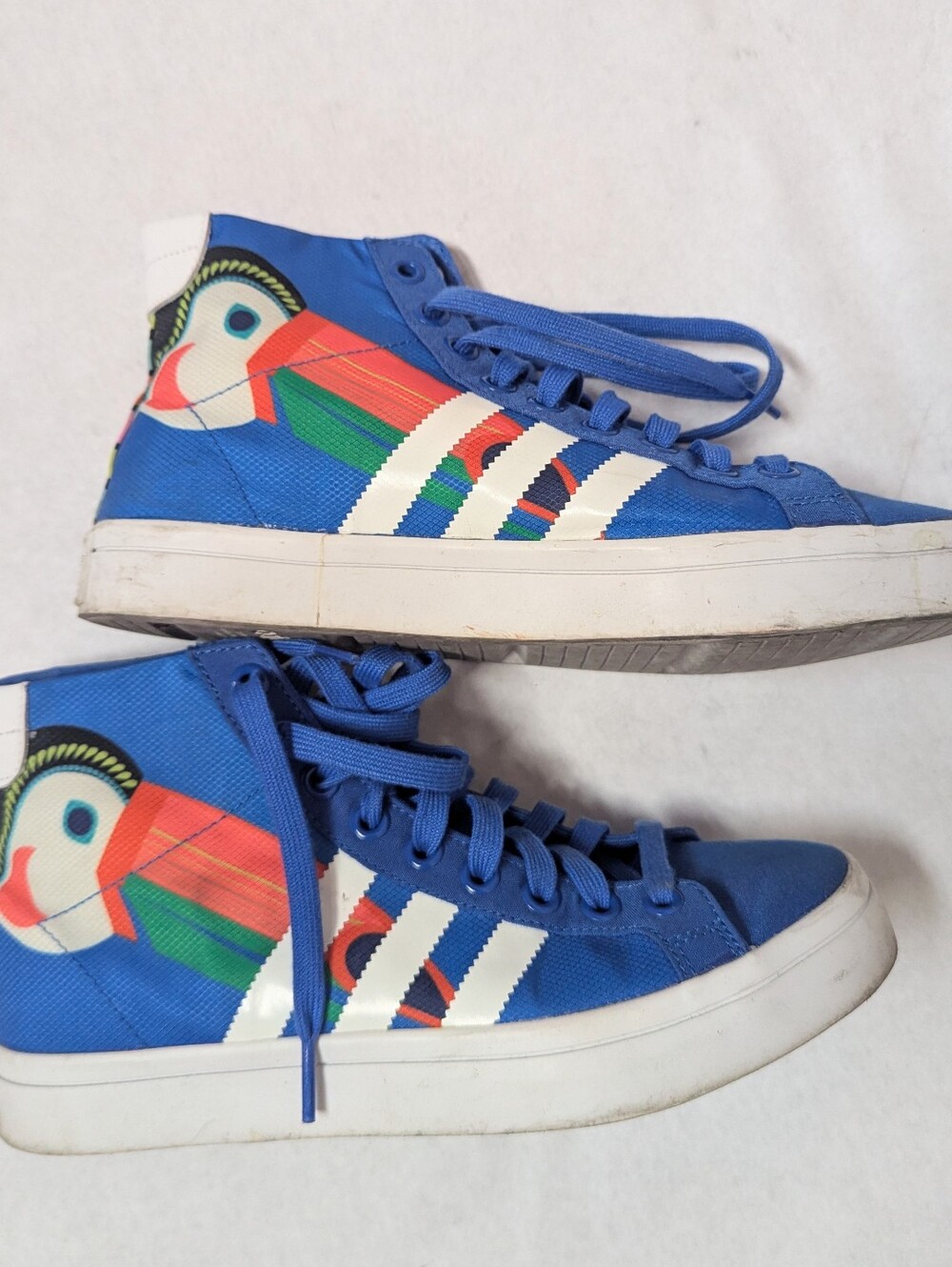 adidas Originals Blue High-Top Sneakers with Colorful Parrot Graphic